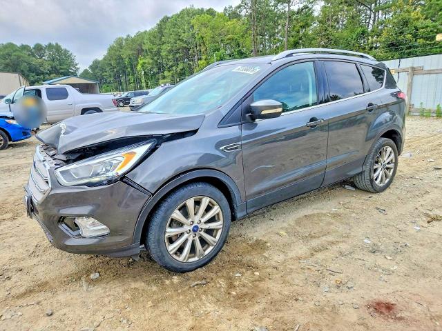 FORD ESCAPE 2017 with VIN 1FMCU9JD8HUA98105 - Photo from auction