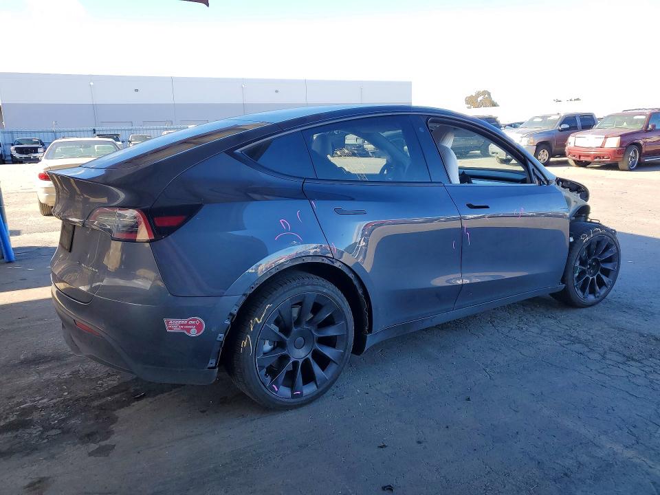 Photo 3 from auction – 2022 TESLA MODEL Y with VIN 7SAYGAEEXNF429246
