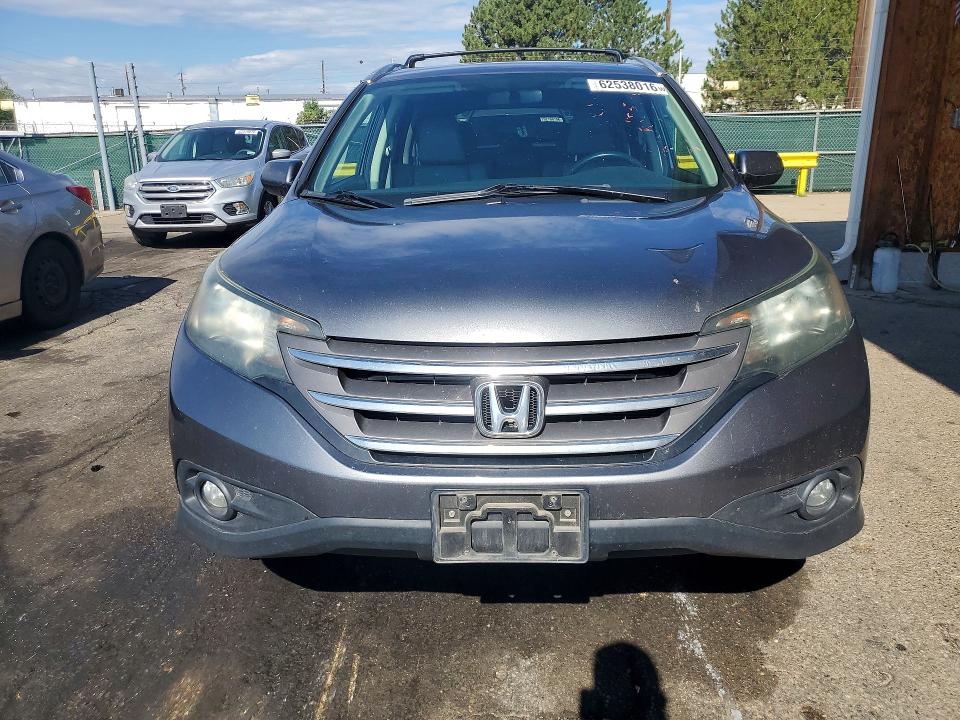 Photo 5 from auction – 2014 HONDA CR-V with VIN 5J6RM4H70EL106209