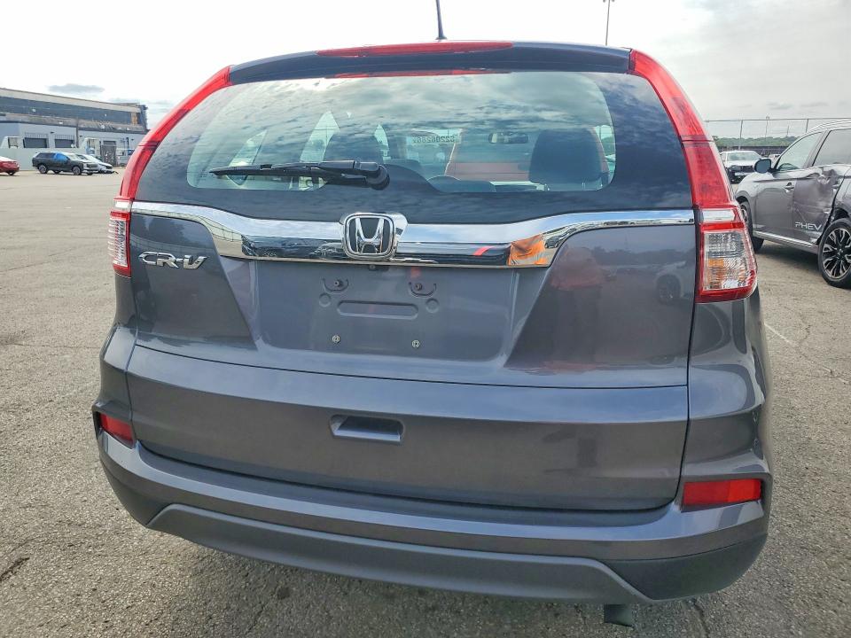 Photo 6 from auction – 2016 HONDA CR-V with VIN 3CZRM3H33GG700977