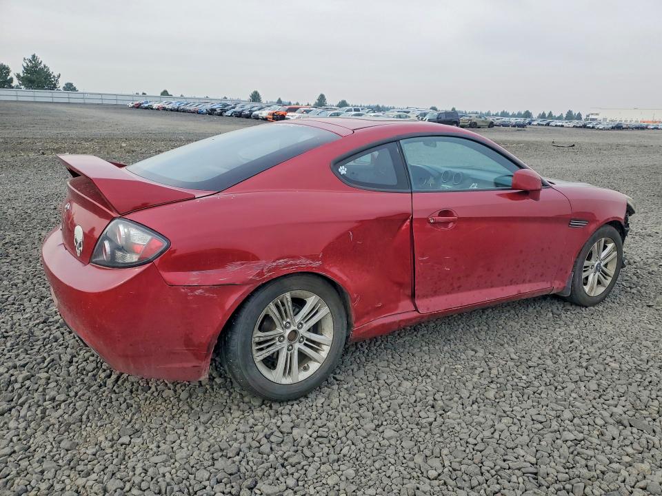 Photo 3 from auction – 2007 HYUNDAI TIBURON with VIN KMHHM66DX7U259131