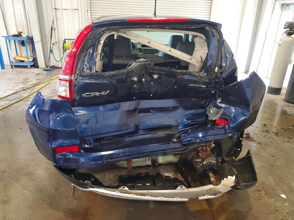 Photo 6 from auction – 2016 HONDA CR-V with VIN 2HKRM4H50GH628172