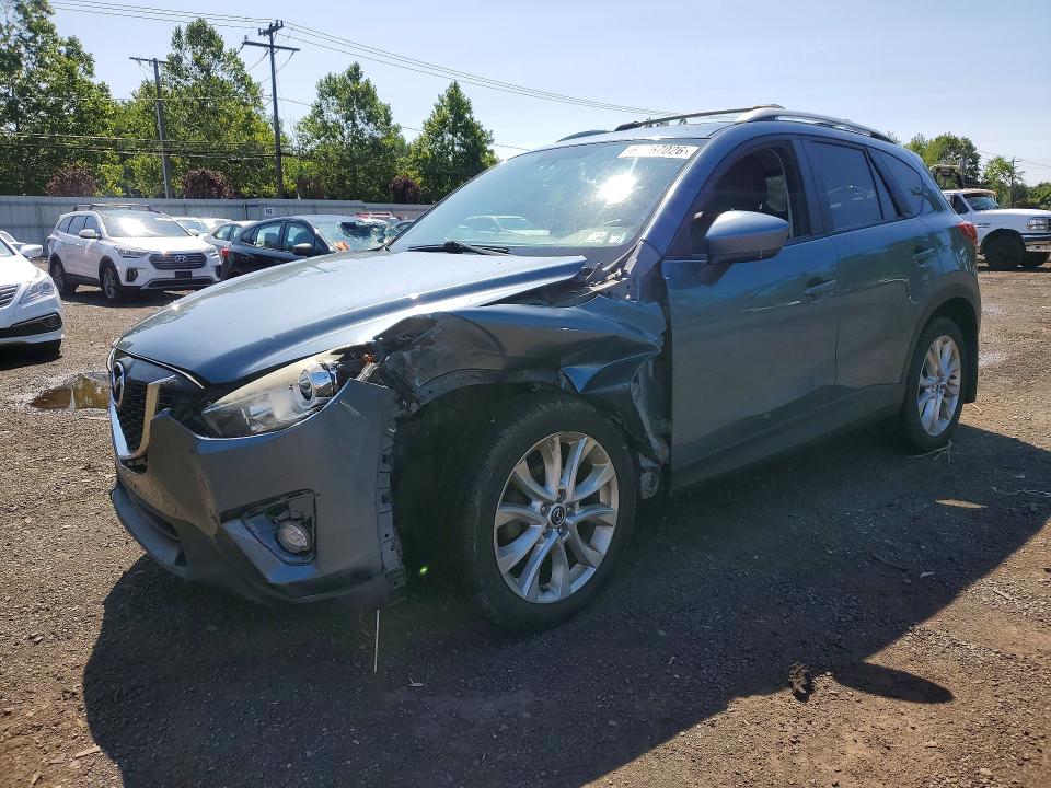 MAZDA CX-5 2014 with VIN JM3KE4DY8E0421657 - Photo from auction