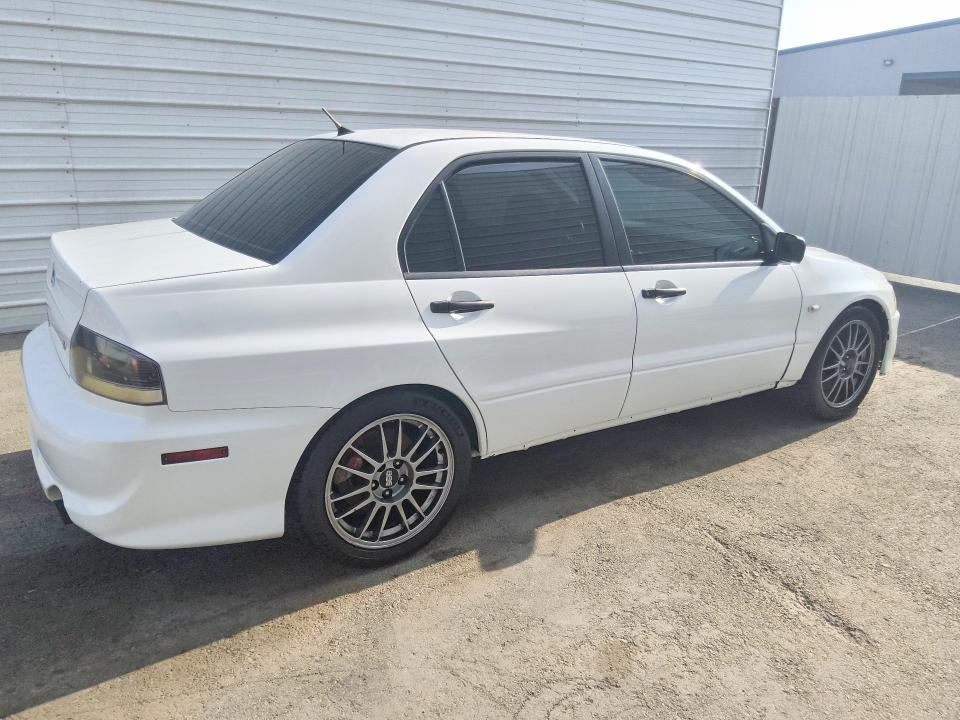 Photo 3 from auction – 2005 MITSUBISHI LANCER with VIN JA3AH36D75U044942