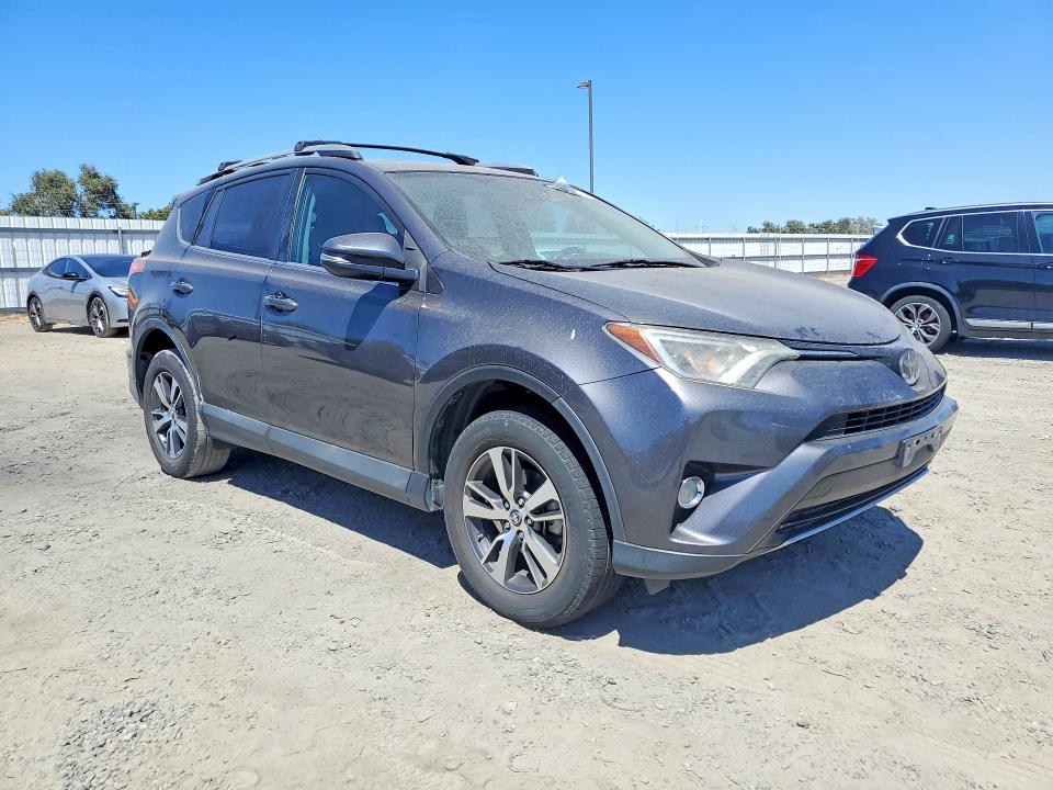 Photo 4 from auction – 2018 TOYOTA RAV4 with VIN 2T3RFREV8JW851653