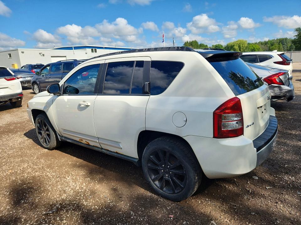 Photo 2 from auction – 2010 JEEP COMPASS with VIN 1J4NF5FB8AD563277