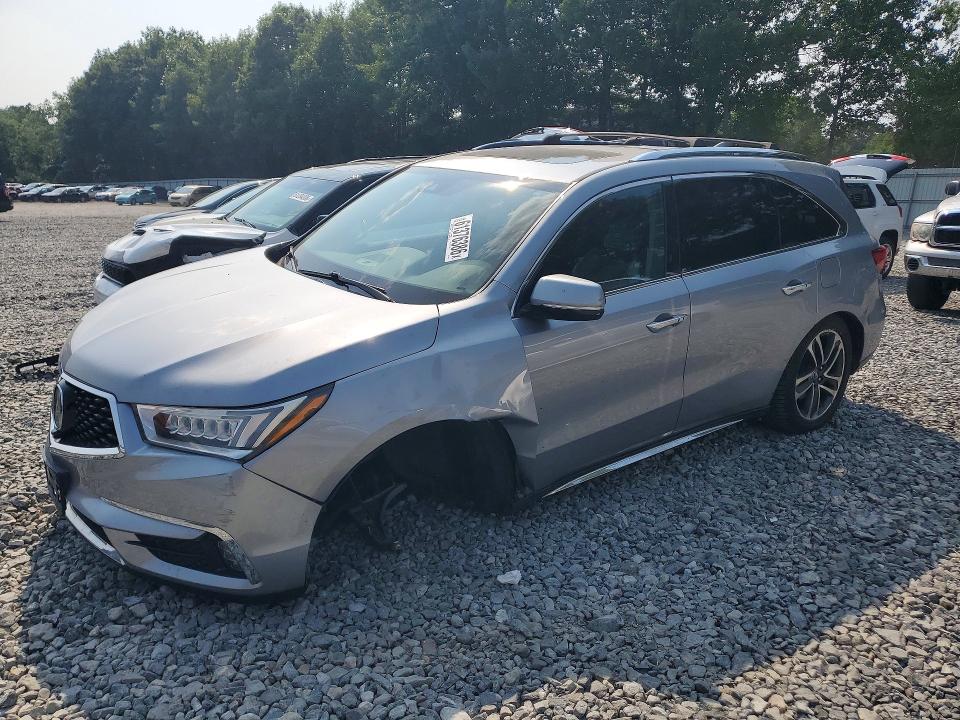 ACURA MDX 2017 with VIN 5FRYD4H98HB004651 - Photo from auction