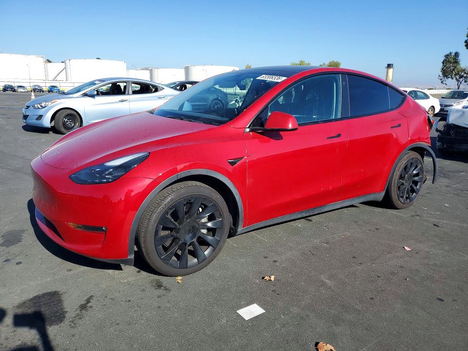 TESLA MODEL Y 2023 with VIN 7SAYGAEE1PF696004 - Photo from auction