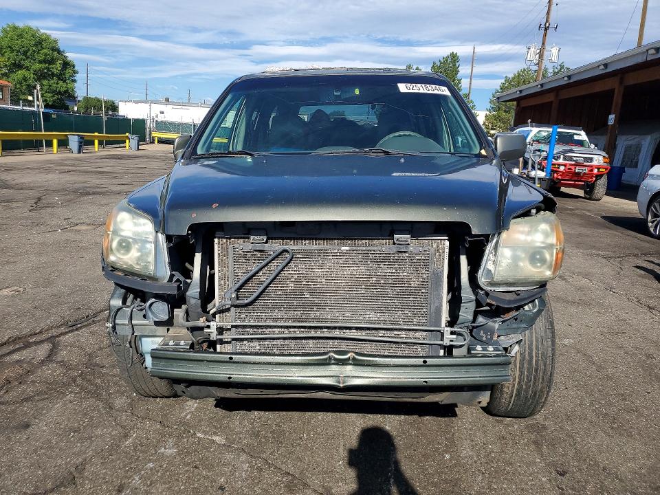 Photo 5 from auction – 2006 HONDA PILOT with VIN 5FNYF18666B021378