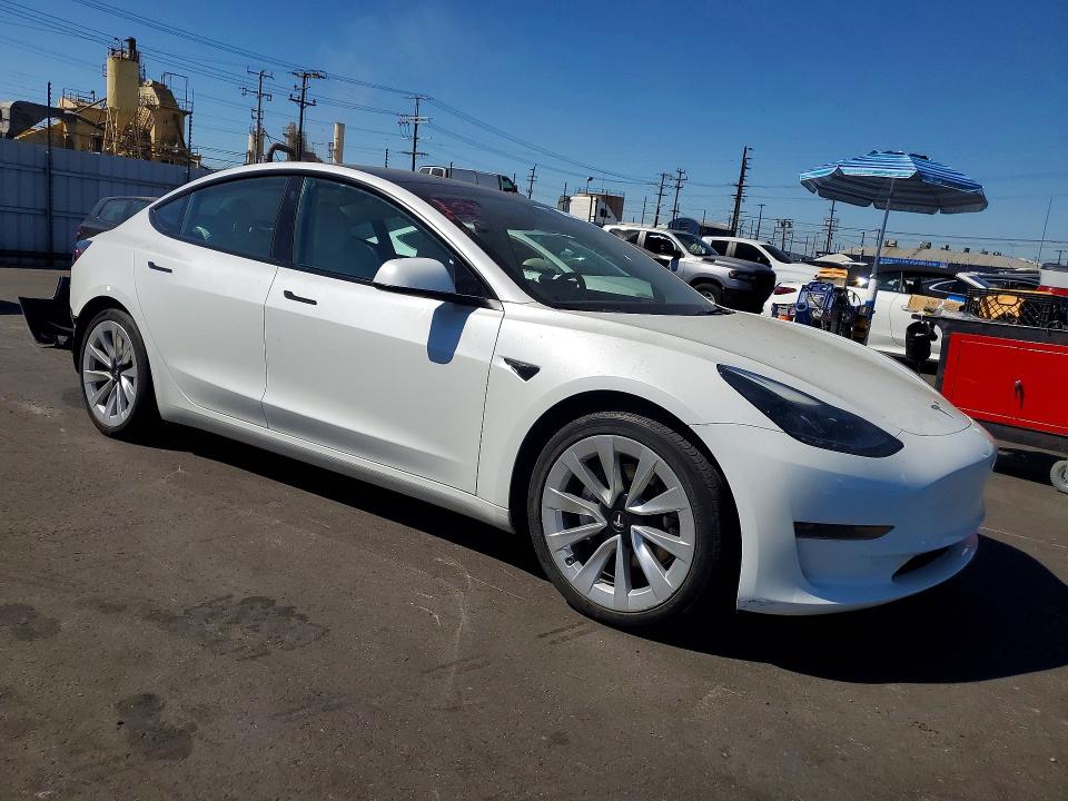 Photo 4 from auction – 2023 TESLA MODEL 3 with VIN 5YJ3E1EA5PF503170