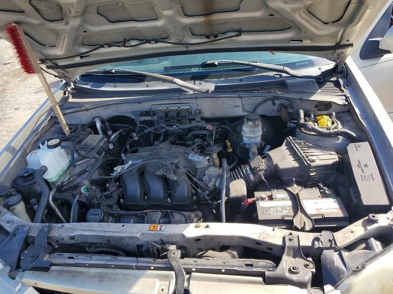 Photo 12 from auction – 2005 MAZDA TRIBUTE with VIN 4F2CZ06175KM32549