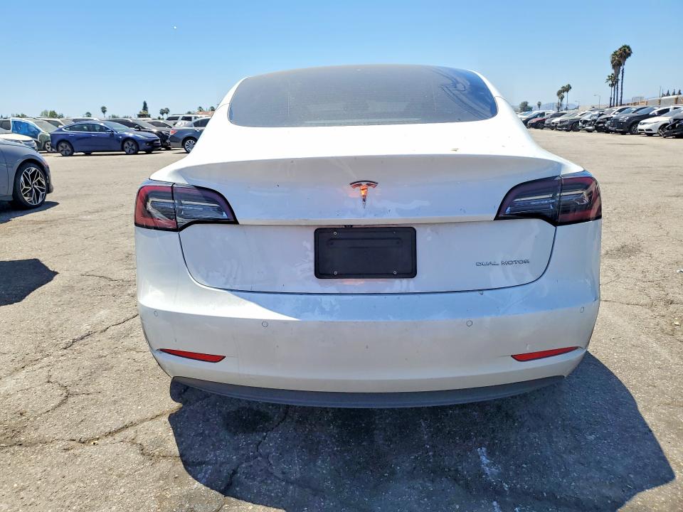 Photo 6 from auction – 2022 TESLA MODEL 3 with VIN 5YJ3E1EB9NF325978