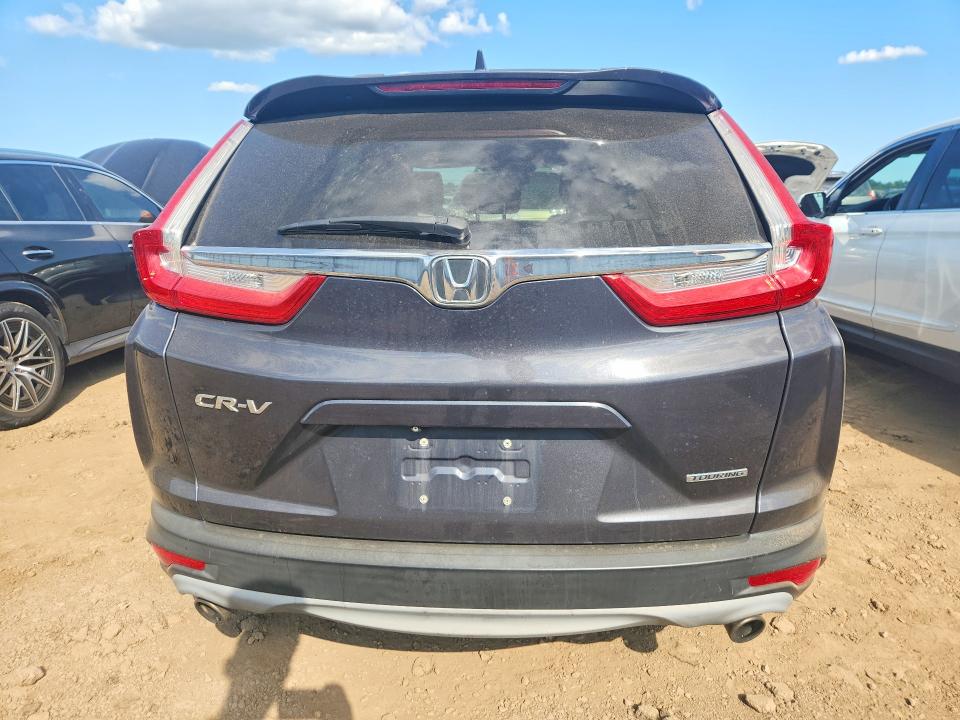 Photo 6 from auction – 2017 HONDA CR-V with VIN 2HKRW1H91HH503369