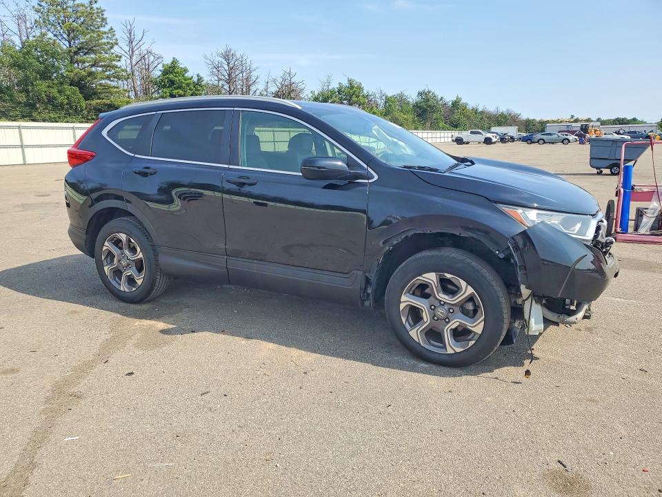 Photo 4 from auction – 2019 HONDA CR-V with VIN 7FARW2H86KE040846