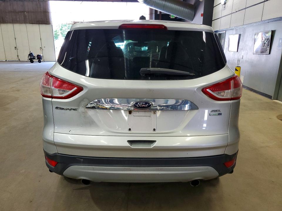 Photo 6 from auction – 2013 FORD ESCAPE with VIN 1FMCU9H98DUD78649