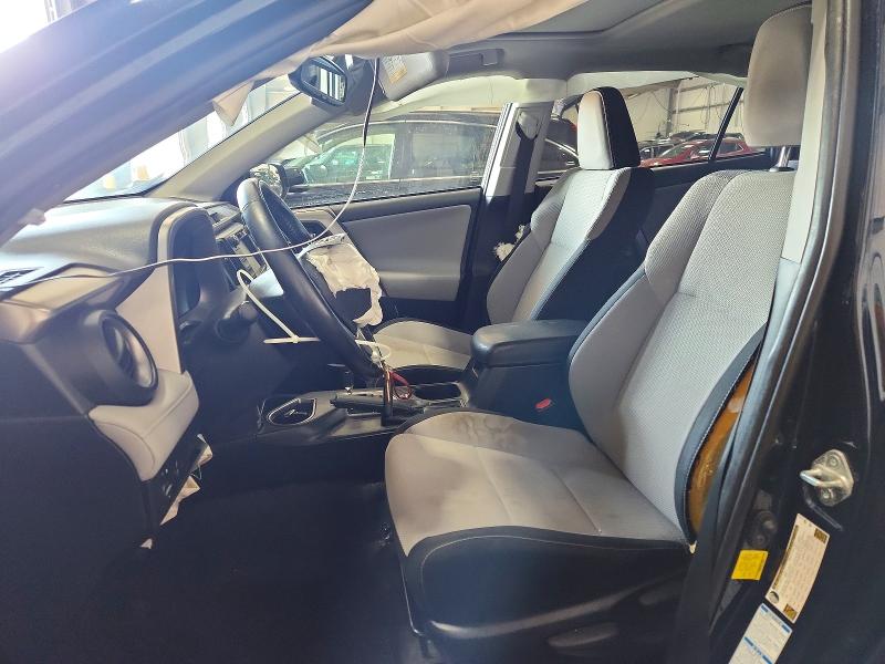 Photo 7 from auction – 2018 TOYOTA RAV4 with VIN JTMRFREV6JJ245556