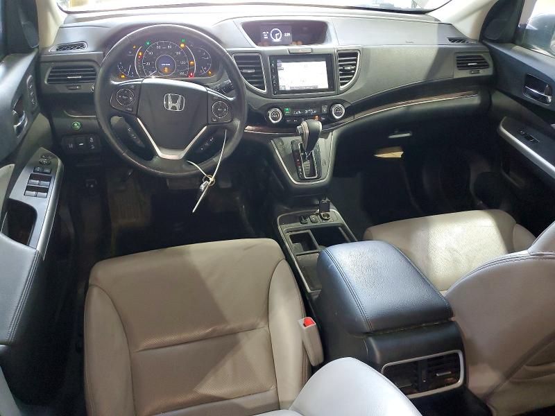 Photo 8 from auction – 2016 HONDA CR-V with VIN 5J6RM4H99GL041395