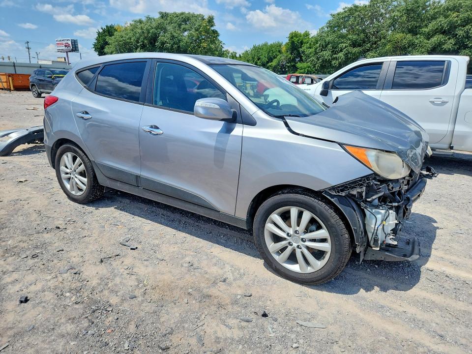 Photo 4 from auction – 2011 HYUNDAI TUCSON with VIN KM8JU3AC2BU144496