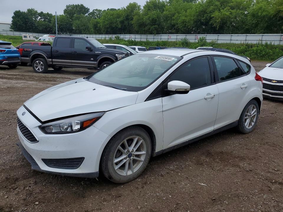 FORD FOCUS 2017 with VIN 1FADP3K23HL215823 - Photo from auction