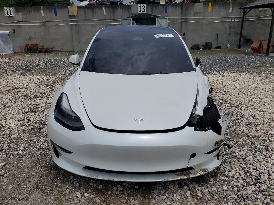 Photo 5 from auction – 2023 TESLA MODEL 3 with VIN 5YJ3E1EC3PF409872