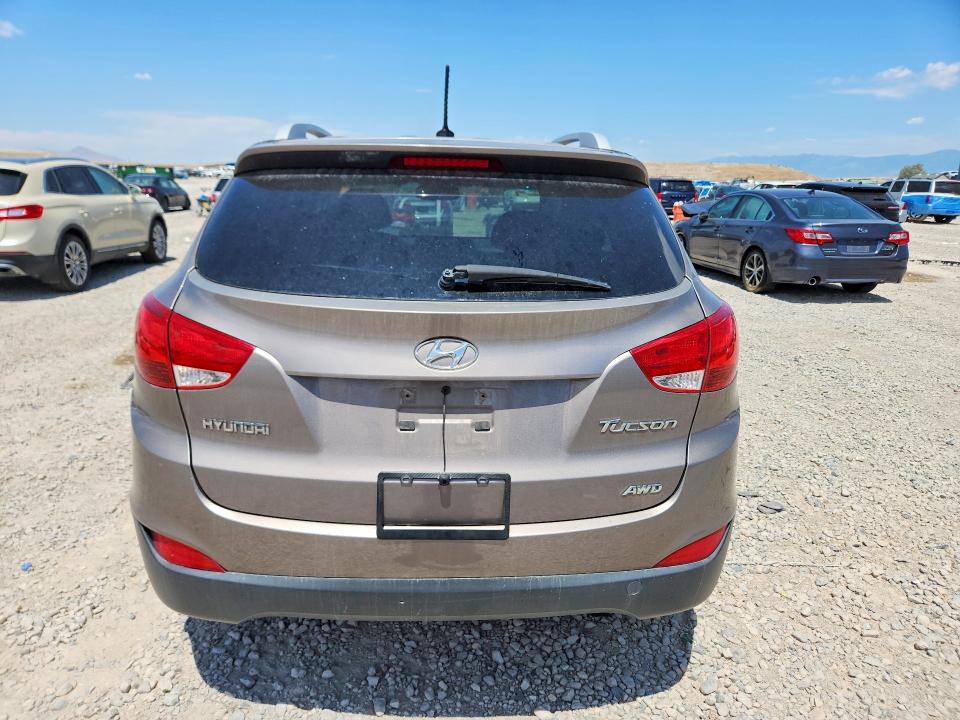 Photo 6 from auction – 2013 HYUNDAI TUCSON with VIN KM8JUCACXDU574599
