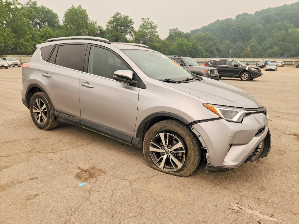 Photo 4 from auction – 2018 TOYOTA RAV4 with VIN 2T3WFREV9JW414294