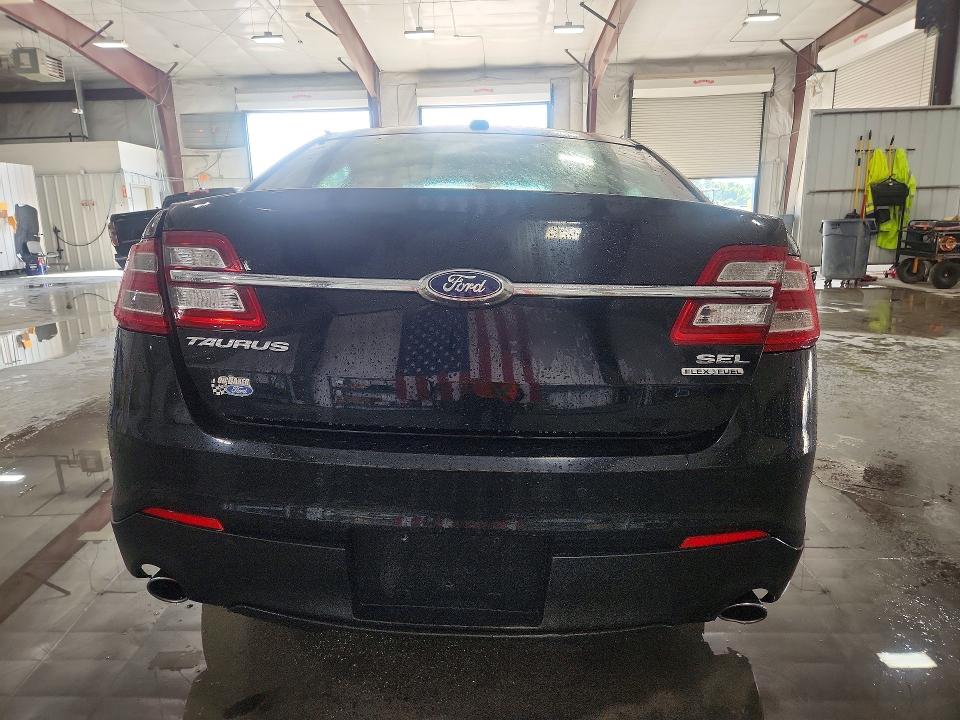 Photo 6 from auction – 2016 FORD TAURUS with VIN 1FAHP2E83GG102778