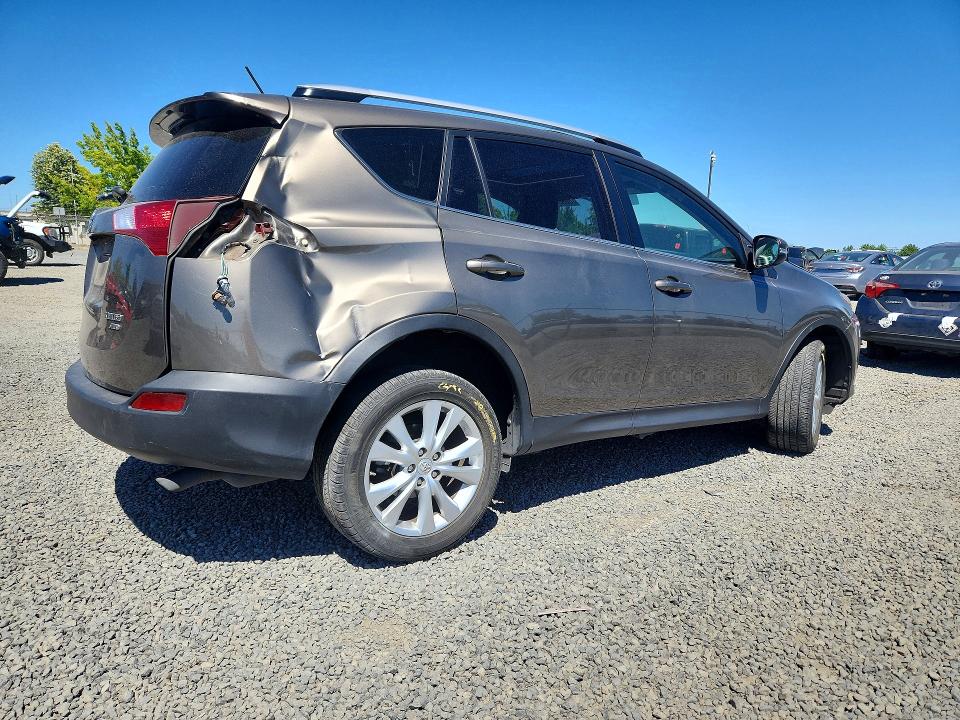 Photo 3 from auction – 2015 TOYOTA RAV4 with VIN JTMDFREV7FD125071