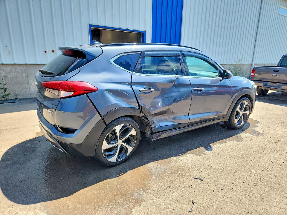 Photo 3 from auction – 2016 HYUNDAI TUCSON with VIN KM8J3CA22GU033884