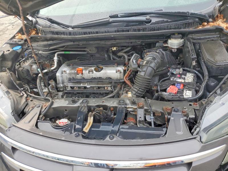 Photo 11 from auction – 2014 HONDA CR-V with VIN 5J6RM4H74EL093562