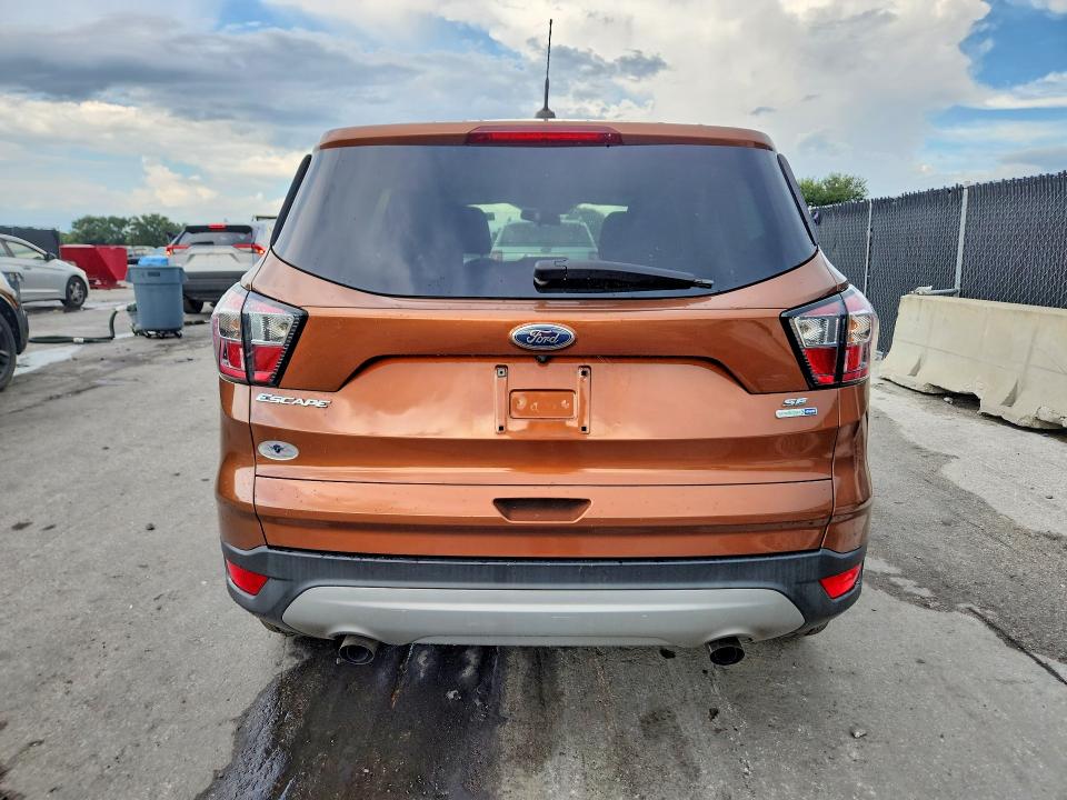 Photo 6 from auction – 2017 FORD ESCAPE with VIN 1FMCU9GD8HUB60805