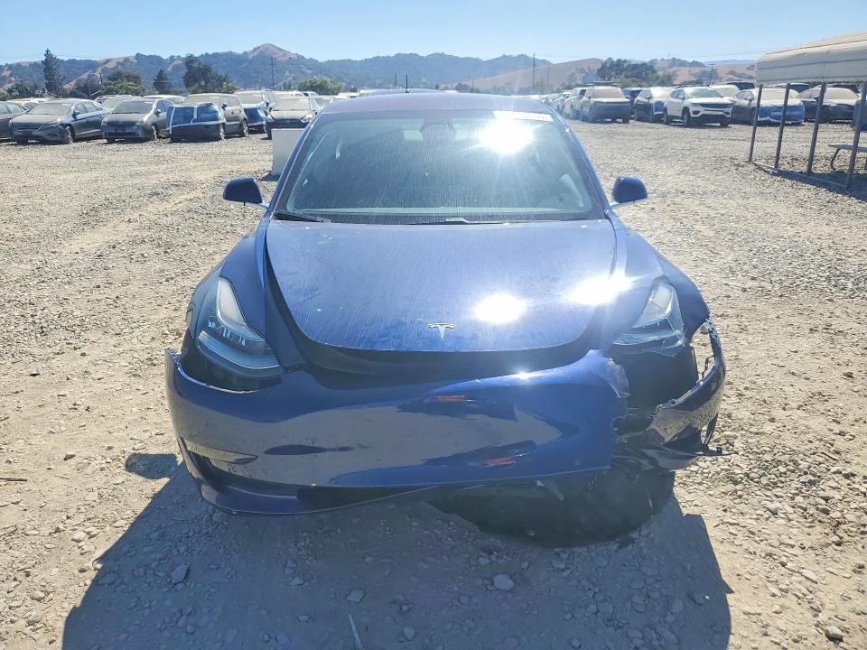 Photo 5 from auction – 2018 TESLA MODEL 3 with VIN 5YJ3E1EA1JF102397