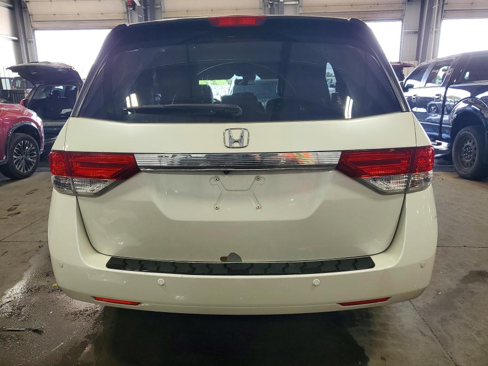 Photo 6 from auction – 2014 HONDA ODYSSEY with VIN 5FNRL5H69EB080749