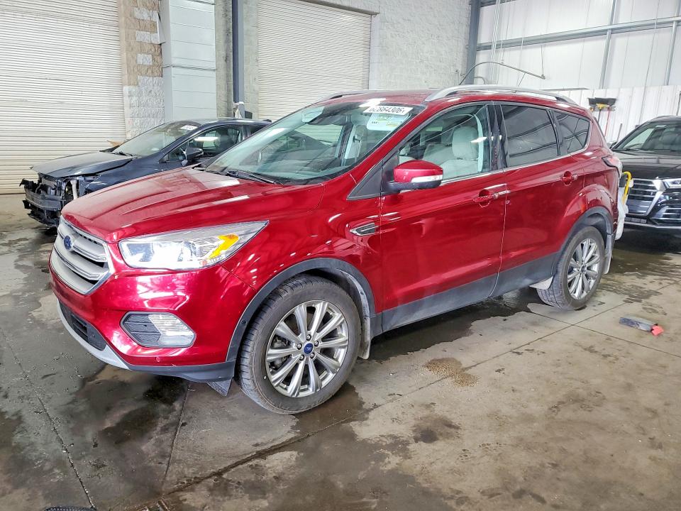 FORD ESCAPE 2018 with VIN 1FMCU9J94JUD59702 - Photo from auction