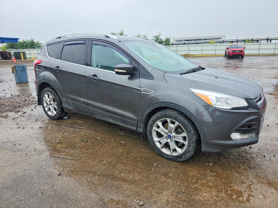 Photo 4 from auction – 2015 FORD ESCAPE with VIN 1FMCU9J93FUB11304