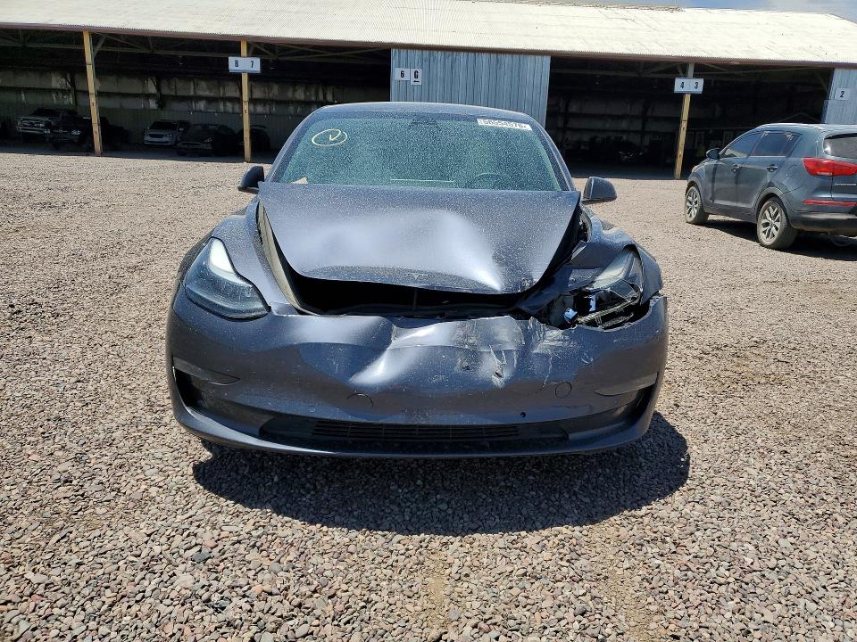 Photo 5 from auction – 2021 TESLA MODEL 3 with VIN 5YJ3E1EC7MF020230