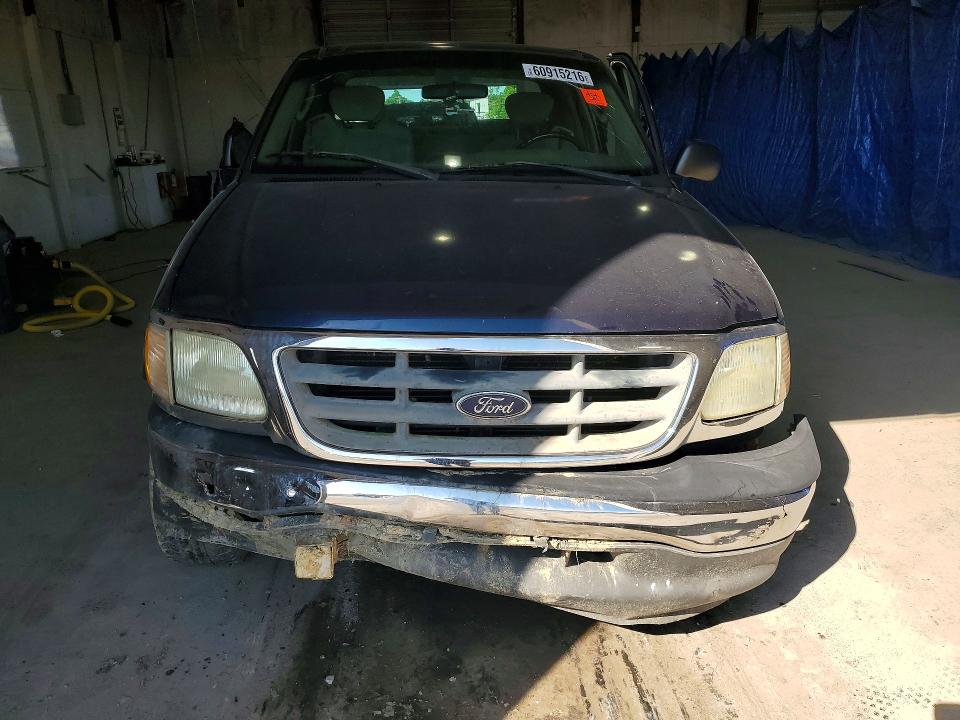Photo 5 from auction – 2003 FORD F150 with VIN 1FTRX17273NA62759
