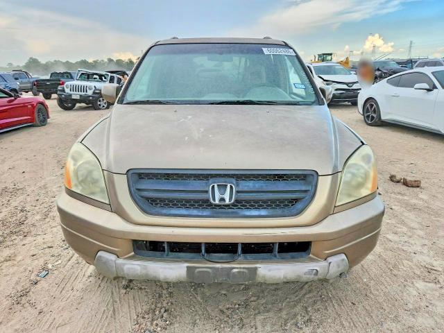 Photo 5 from auction – 2004 HONDA PILOT with VIN 2HKYF18764H608011