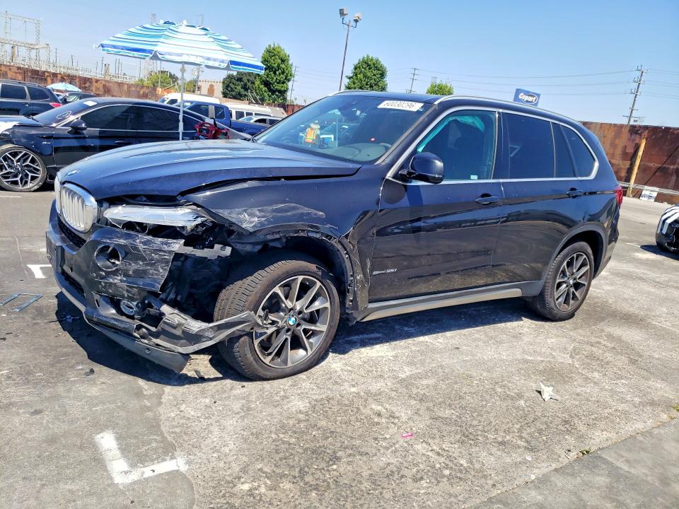 BMW X5 2018 with VIN 5UXKR2C58J0Z16605 - Photo from auction