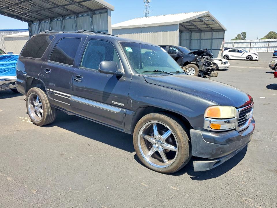 Photo 4 from auction – 2003 GMC YUKON with VIN 1GKEC13VX3R311711