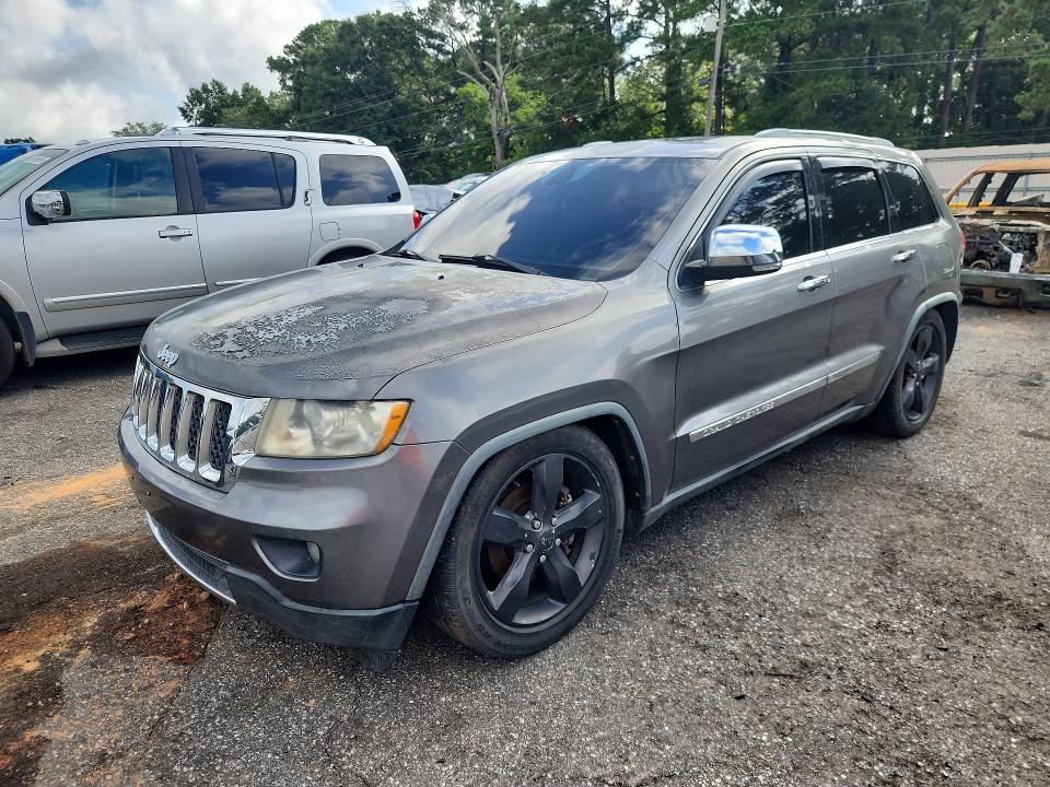 JEEP GRAND CHEROKEE 2011 with VIN 1J4RR6GT9BC583924 - Photo from auction