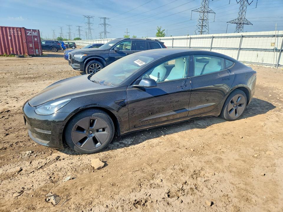 TESLA MODEL 3 2023 with VIN 5YJ3E1EAXPF685951 - Photo from auction