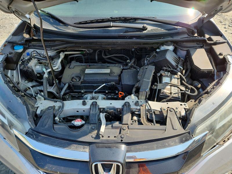 Photo 12 from auction – 2015 HONDA CR-V with VIN 2HKRM3H77FH529195