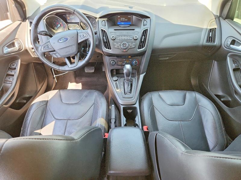 Photo 8 from auction – 2016 FORD FOCUS with VIN 1FADP3F20GL395190