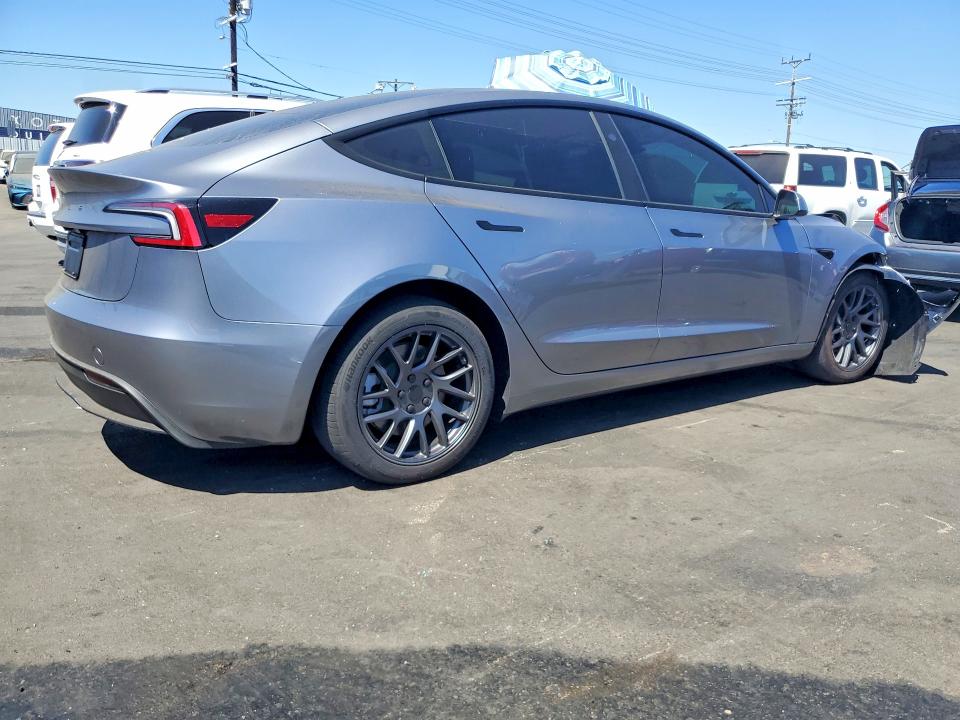 Снимка 3 от търг – 2026 TESLA MODEL 3 с VIN 5YJ3E1EAXTF201366