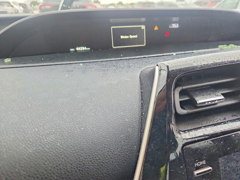 Photo 9 from auction – 2021 TOYOTA PRIUS with VIN JTDKAMFU4M3145151