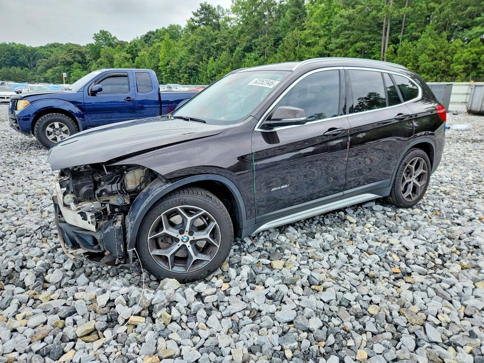 BMW X1 2017 with VIN WBXHT3C39H5F87109 - Photo from auction