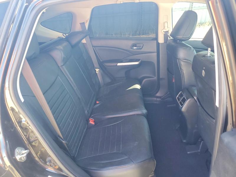 Photo 11 from auction – 2015 HONDA CR-V with VIN 5J6RM4H79FL134317