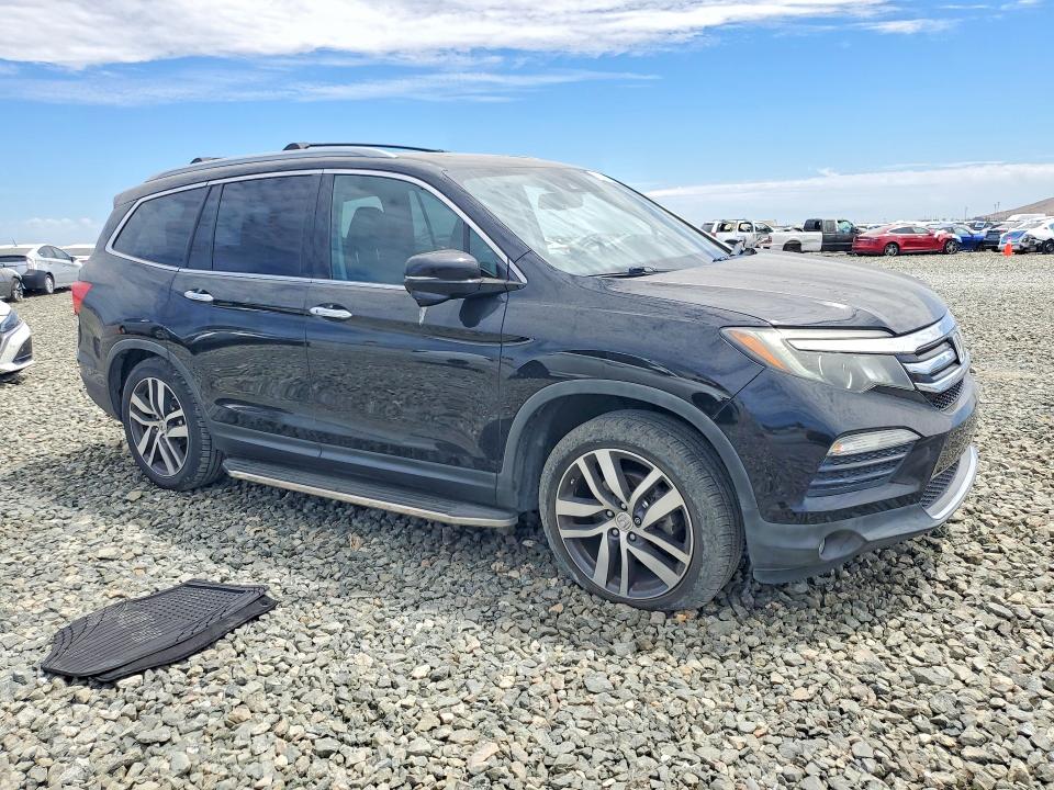 Photo 4 from auction – 2016 HONDA PILOT with VIN 5FNYF6H94GB095200