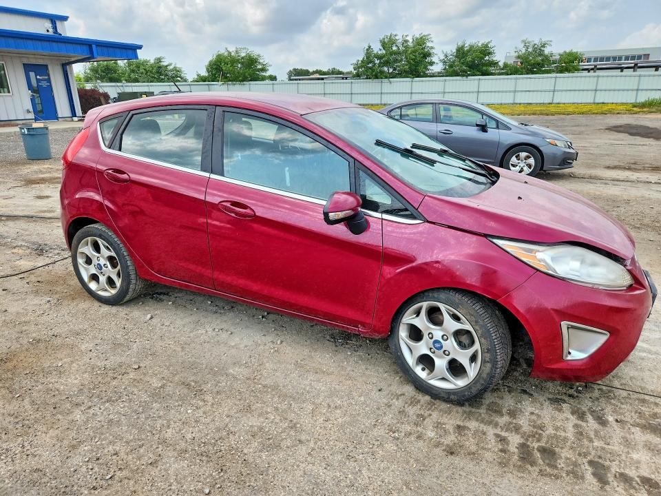 Photo 4 from auction – 2011 FORD FIESTA with VIN 3FADP4FJ9BM119708
